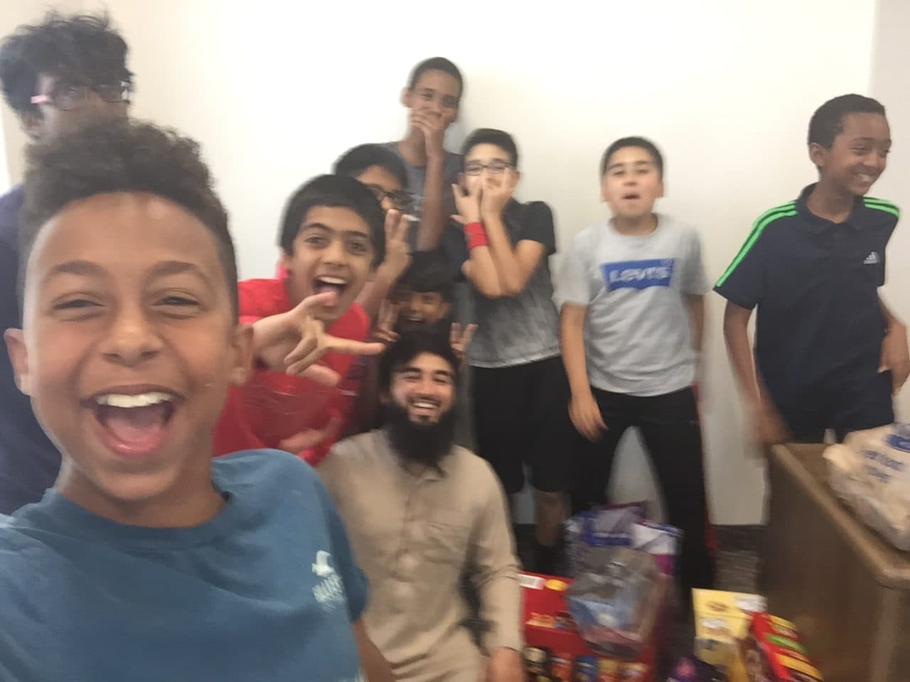 Boys during a Qur’an class celebration of achieving their goals