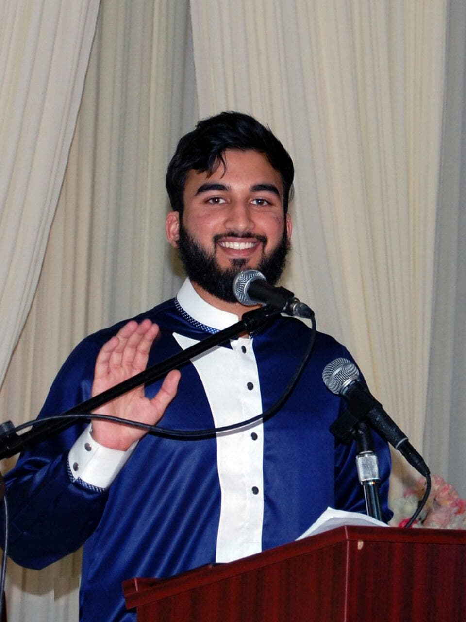 Irslan as MC of a major da’wah event in Irving, TX