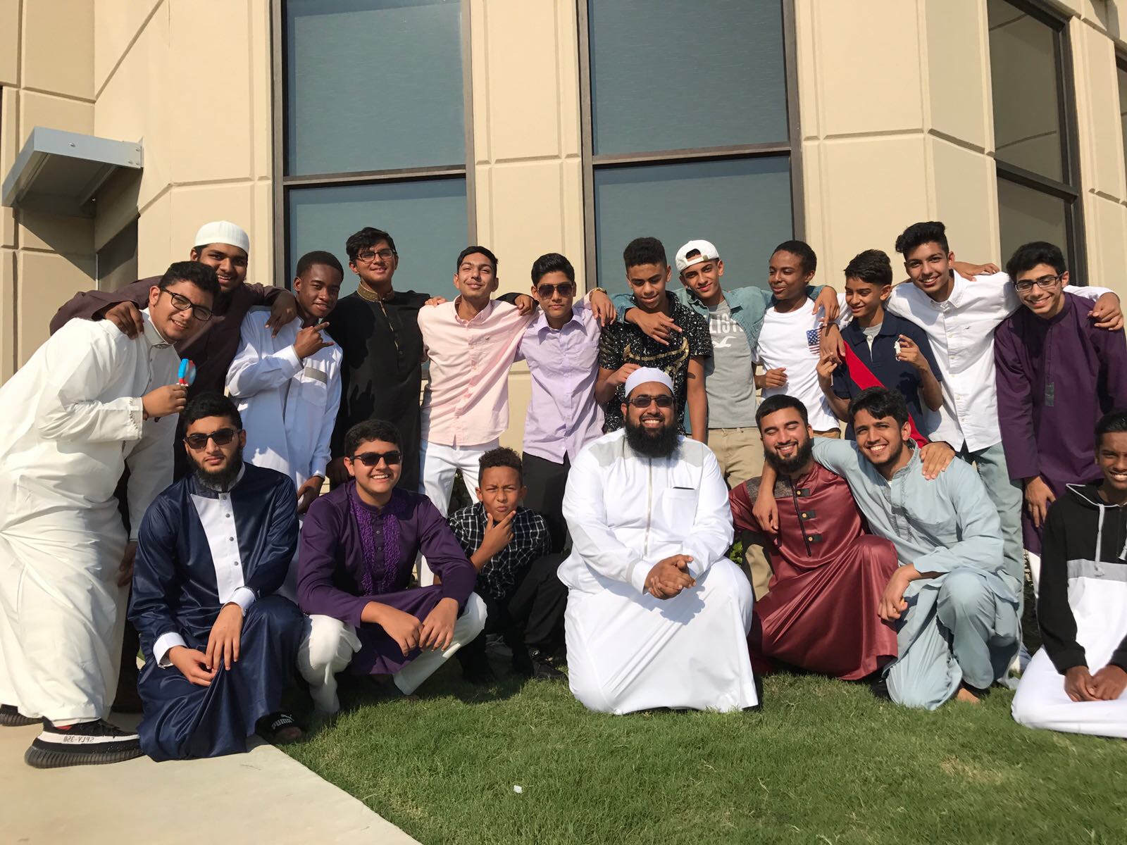 A cohort with its teacher on Eid morning, friendships years deep